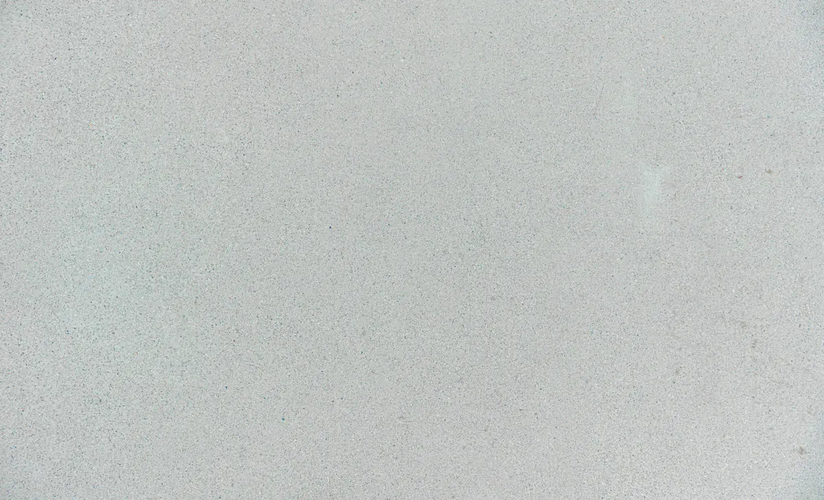 Smooth grey concrete surface with a fine granular texture